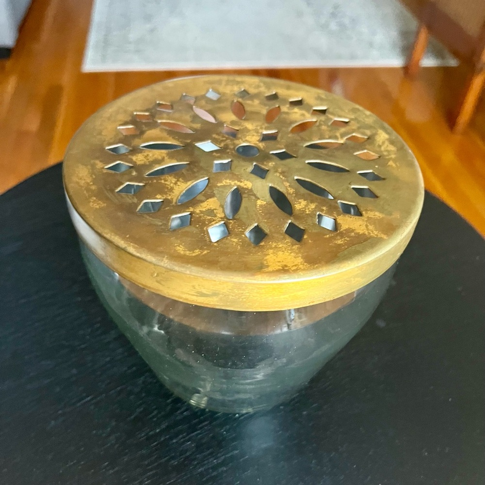 Glass jar with top.